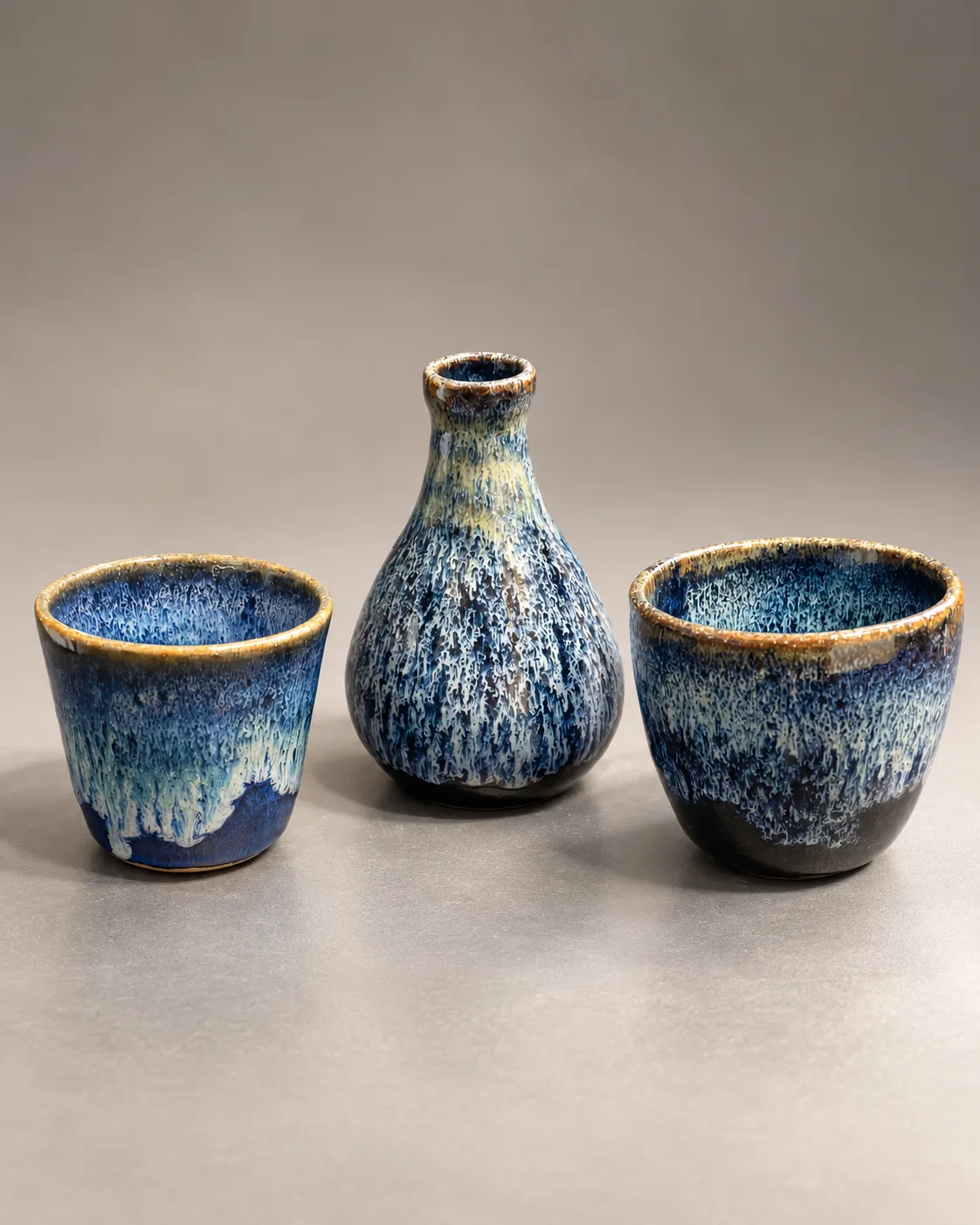 Waves Blue set: two cups and a bud vase in variegated blue glaze