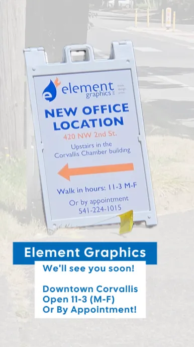 Story frame showing the new office location sandwich board sign